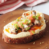 sardine over hummus with a twist